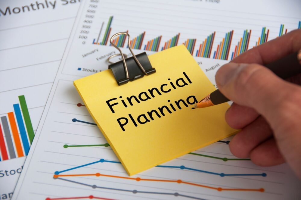 financial-planning-text-yellow-notepad-with-financial-data-analysis-background-financial-planning-concept-1-scaled